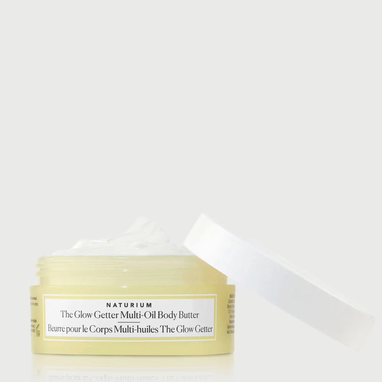 the-glow-getter-multi-oil-body-butter-travel-size-l7 NATR-40115_Glow-Getter-Body-Butter-Mini_front_capoff_bonebkgd.webp